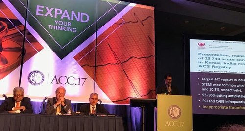 ACC 17 conference with a few guests on stage and a man giving a speech
